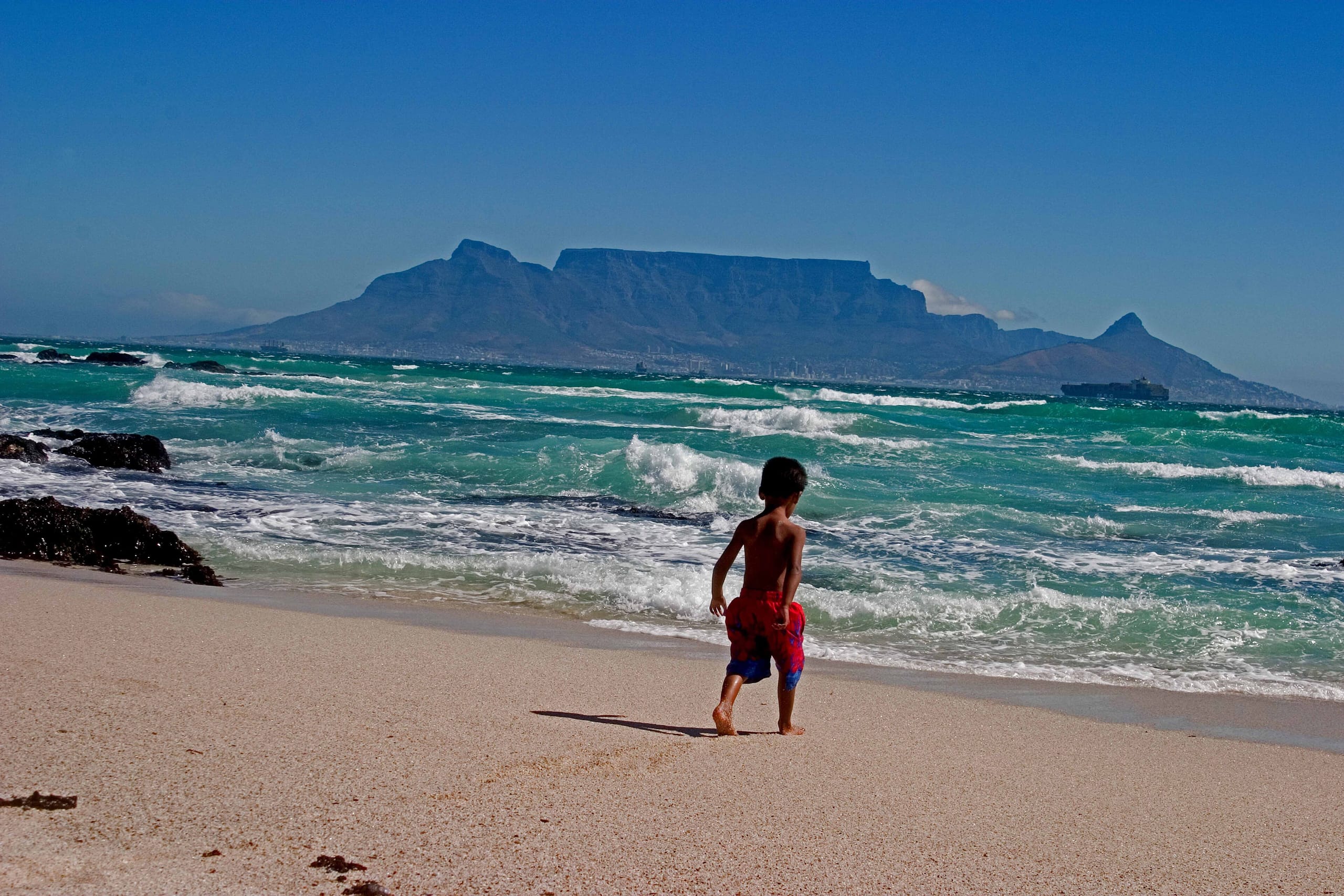 Table Mountain seen across the bay from Bloubergstrand beach